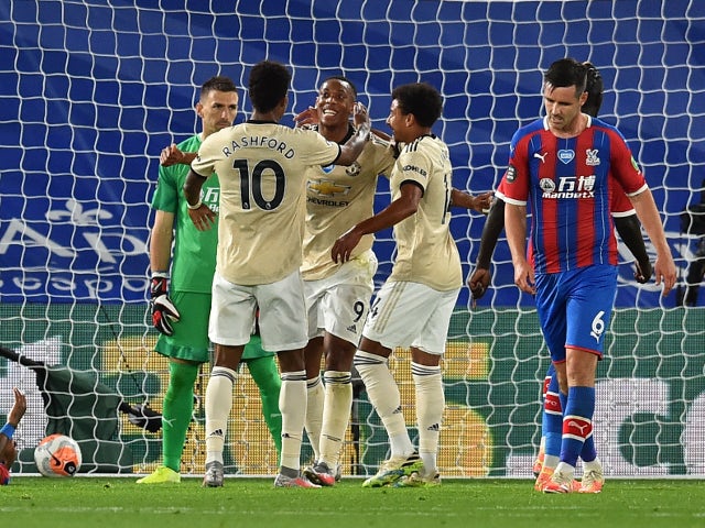 Manchester United players celebrate Anthony Martial's goal against Crystal Palace on July 16, 2020