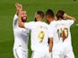 Real Madrid players celebrate Karim Benzema's goal against Villarreal on July 16, 2020