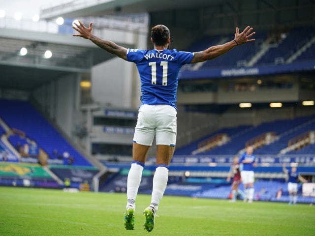 Everton's Theo Walcott celebrates scoring against Aston Villa on July 16, 2020