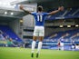 Everton's Theo Walcott celebrates scoring against Aston Villa on July 16, 2020