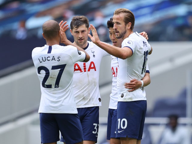 Harry Kane celebrates with Tottenham Hotspur teammates after scoring against Leicester City on July 19, 2020