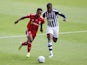 West Bromwich Albion's Romaine Sawyers in action with Fulham's Denis Odoi on July 14, 2020