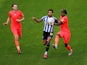 Sheffield Wednesday's Jacob Murphy battles with Huddersfield Town players on July 14, 2020