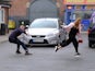 Gary pushes Sarah to safety on Coronation Street on July 29, 2020