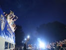 Leeds United players celebrate winning the Championship trophy with an open-top bis parade on July 22, 2020