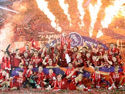 Liverpool players and staff celebrate winning the 2019-20 Premier League title