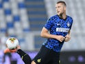 Milan Skriniar warms up for Inter on July 16, 2020