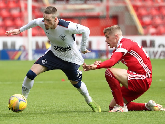 Aberdeen's Dean Campbell in action with Rangers's Ryan Kent in the Scottish Premiership on August 1, 2020