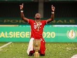 Bayern Munich's David Alaba pictured with the DFB-Pokal trophy in July 2020
