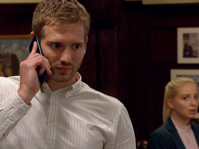 Jamie takes a call on Emmerdale on July 27, 2020