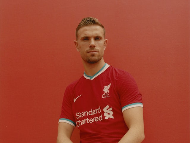 Captain of the world, European and English champions Hendo models the 2020-21 Liverpool kit