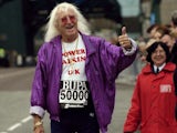 Jimmy Savile pictured in his 2004 pomp