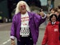 Jimmy Savile pictured in his 2004 pomp