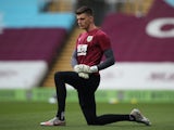 Nick Pope warms up for Burnley on July 26, 2020