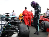Lewis Hamilton looks at his tyre puncture during the British Grand Prix on August 2, 2020
