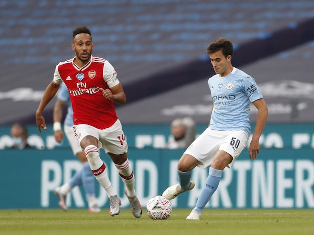 Arsenal's Pierre-Emerick Aubameyang in action with Manchester City's Eric Garcia in the FA Cup on July 18, 2020