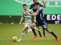 Celtic's Ryan Christie in Scottish Premiership action with Hamilton Academical's Shaun Want on August 3, 2020