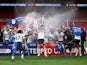 Fulham players celebrate winning promotion to the Premier League on August 4, 2020