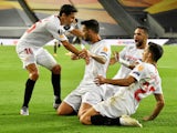 Sevilla players celebrate Suso's goal against Manchester United on August 16, 2020