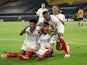 Sevilla players celebrate Lucas Ocampos's goal against Wolverhampton Wanderers on August 11, 2020