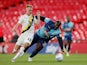 Oxford United's Mark Sykes in action with Wycombe Wanderers's Adebayo Akinfenwa in the League One playoff final on July 13, 2020