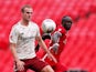 Arsenal's Rob Holding in action with Liverpool's Sadio Mane in the Community Shield on August 29, 2020