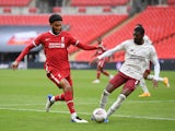 Liverpool's Joe Gomez in action with Arsenal's Ainsley Maitland-Niles during the Community Shield on August 29, 2020