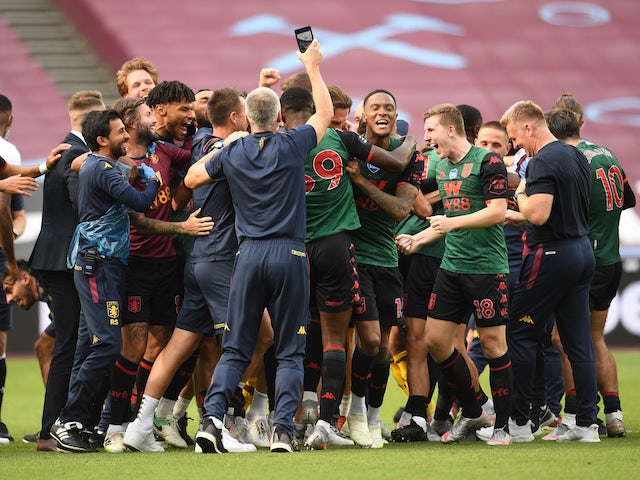 Aston Villa players and staff celebrate avoiding relegation in July 2020