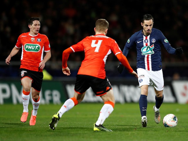 Lorient's Julien Laporte in action with Paris Saint-Germain's Pablo Sarabia in January 2020