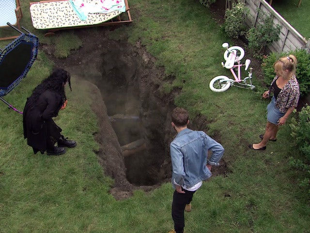 The group peer down the sinkhole on Coronation Street's first episode on September 11, 2020