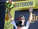 Caleb Ewan celebrates on the podium at the Tour de France on August 31, 2020