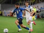 Italy's Lorenzo Insigne in action with Bosnia-Herzegovina's Gojko Cimirot in the UEFA Nations League on September 4, 2020