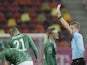 Northern Ireland's Josh Magennis is shown a red card against Romania on September 4, 2020
