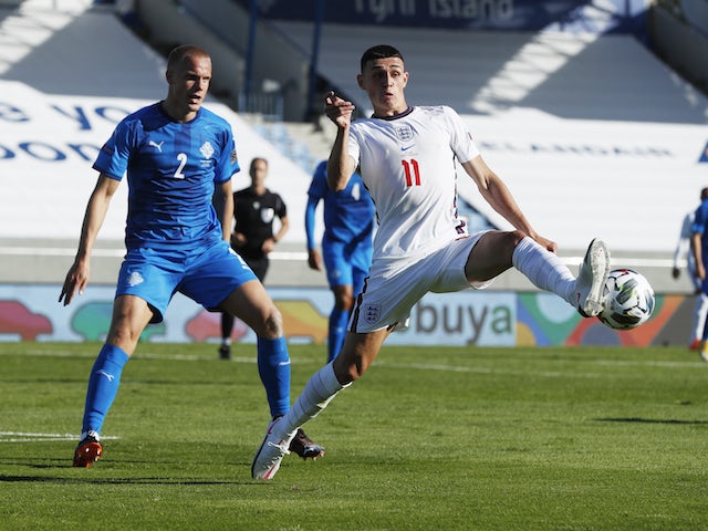 England's Phil Foden in action with Iceland's Hjortur Hermannsson in the UEFA Nations League on September 5, 2020