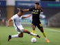 Swansea City's Ben Cabango in action with Brentford's Ollie Watkins in July 2020