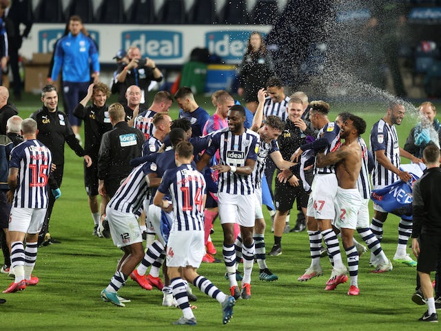 West Bromwich Albion players and staff celebrate winning promotion in 2019-20