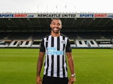 Callum Wilson poses in a Newcastle kit after joining the club in September 2020