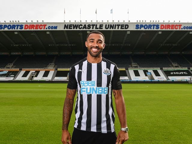 Callum Wilson poses in a Newcastle kit after joining the club in September 2020