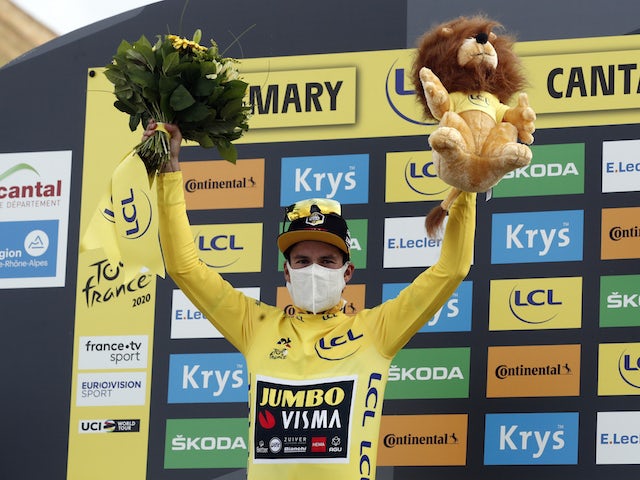Primoz Roglic pulls ahead in yellow jersey as Dani Martinez wins stage 13