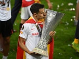 Sergio Reguilon pictured with the Europa League trophy after winning the final with Sevilla in August 2020