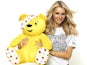 Tess Daly fondling Pudsey The Bear in plain sight