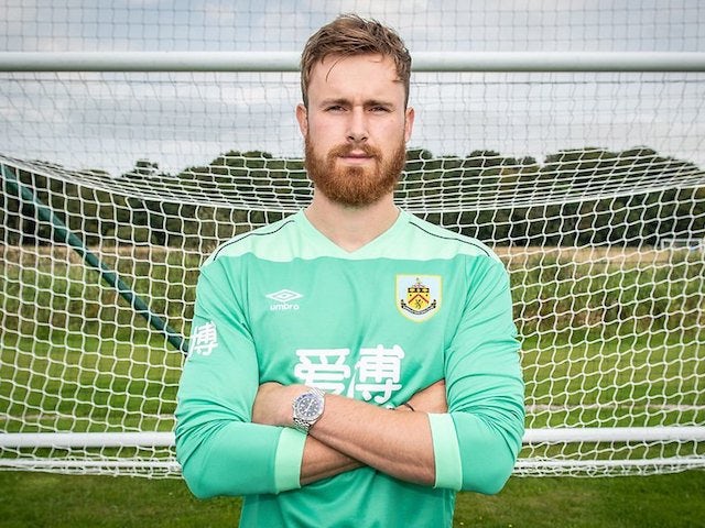 Will Norris poses after signing for Burnley in August 2020