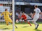 Luton Town's Jordan Clark scores against Derby County on September 19, 2020