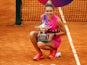 Simona Halep celebrates with the Italian Open title on September 21, 2020