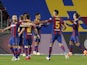 Barcelona players celebrate scoring against Sevilla on October 5, 2020