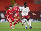 Arsenal's Bukayo Saka in action with Liverpool's Neco Williams in the EFL Cup on October 1, 2020