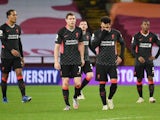 Liverpool players look dejected after conceding their seventh goal against Aston Villa on October 4, 2020