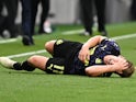 Matt Ritchie lies injured after dislocating his shoulder during Newcastle United's match with Tottenham Hotspur in September 2020
