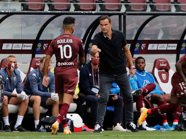 Metz manager Vincent Hognon pictured with Farid Bouyala in August 2020