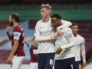 Raheem Sterling brace helps Manchester City ease into quarter-finals
